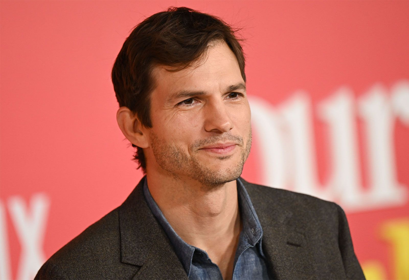 actor ashton kutcher at world premiere of your place is mine regency village theater los angeles california february 2 2023 - Harry Styles Store